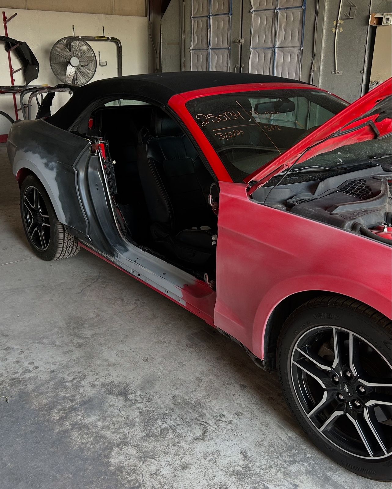 Mustang mid-repair, structural rebuild in progress